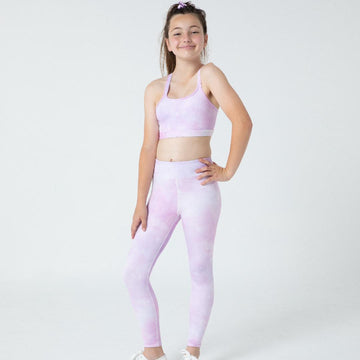 Girl wearing Purple Mist gymnastics leggings during active movement